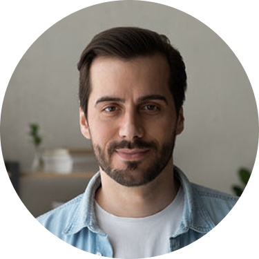 A smiling man with dark hair